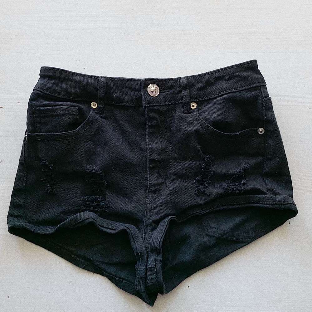 Black ripped shorts